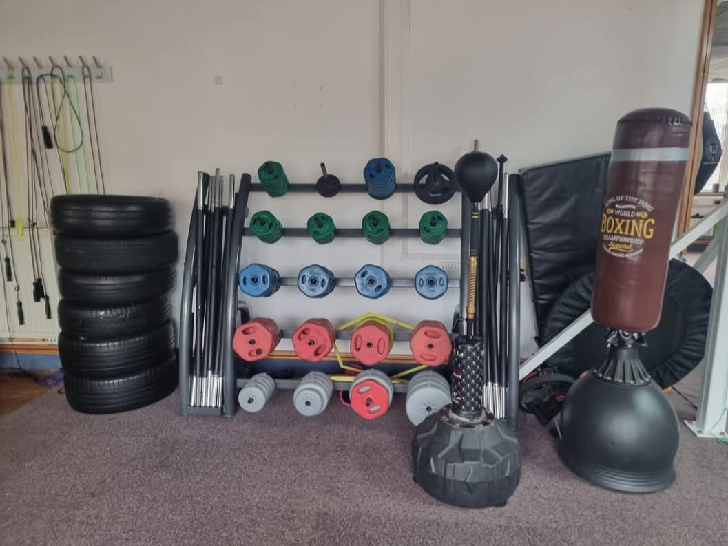 Battle ropes, tyre and sledgehammer in the functional training zone.